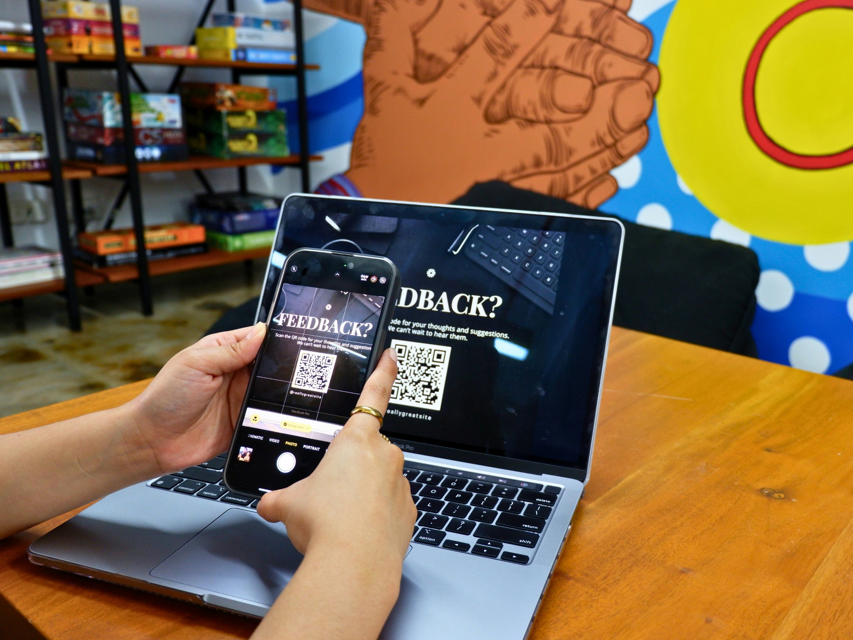 A person scanning a QR code to provide feedback for virtual learning session.